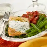 Baked Salmon, Creamy Dill Sauce, Spinach, Green Beans, Tomatoes