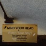 King Alfred's Kitchen - High Street, Shaftesbury - sign - Mind your head