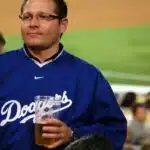 To be a Dodgers' fan,beer,uniform and cheer it loud!