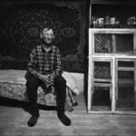 Portrait of Jurka Shutenko on the background of the carpet and remove the old windows