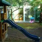 Delightful backyard playground for a disabled child, play fort, slide, toy car, Guadalajara, Jalisco, Mexico