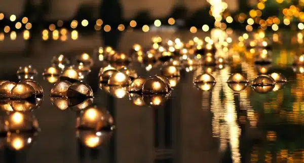 Floating Holiday Candles in Reflection Pool