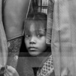 Images Through a Bus Window #7: Peering between the curtains