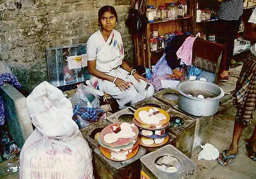 in one of the Calcutta Rescue makeshift clinics : 'MBSC', Milk-Biscuits-Soap-Cereals + a piece of cloth to be distributed to each patient at the end of the consultation, with the medicine to be taken