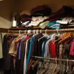 Clothes Closet, overstuffed with clothes, Greenwood, Seattle, Washington, USA