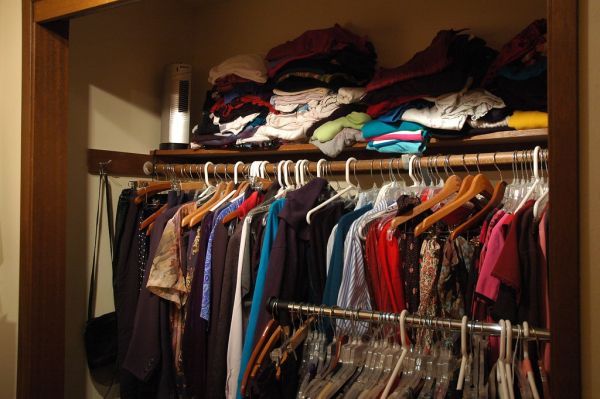 Clothes Closet, overstuffed with clothes, Greenwood, Seattle, Washington, USA
