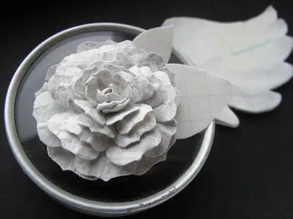 hand cut paper rose emboss resist with paint